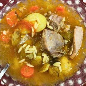 Kreatosoupa, greek meat soup with orzo pasta